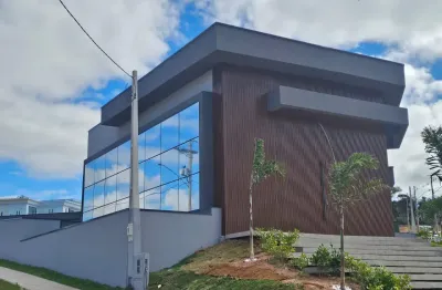 Excelente casa de alto padrão com 4 suítes no condomínio terras alvorada