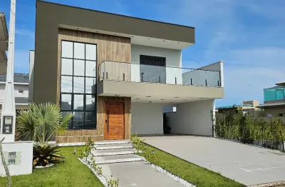 Linda casa alto padrão  à venda em condomínio  na cidade de peruibe