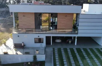Espetacular casa com 5 dormitorios suite master com closet hidroa venda com piscina no condominio colinas de inhandjara em itupeva sp