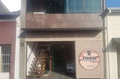 Casa 3 dormitórios sendo 3 suites com ponto comercial próximo ao centro de jacareí