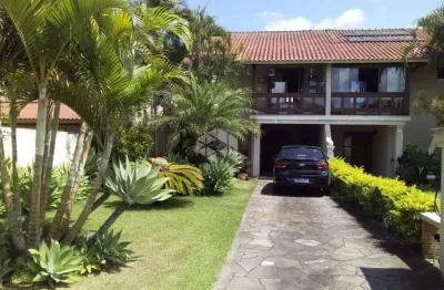 Casa em condomínio fechado com 3 quartos à venda na avenida eduardo prado, 2050, cavalhada, porto alegre, 234 m2 por r$ 975.000