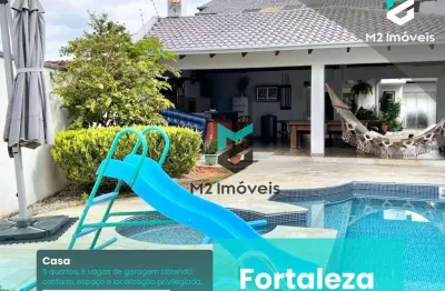 Residência dos sonhos: 5 dormitórios (3 suítes), piscina com água salgada, aquecimento solar, excelente localização!