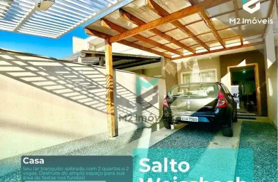 Sobrado com um maravilhoso espaço para área de festas nos fundos e 2 vagas de garagem na frente.