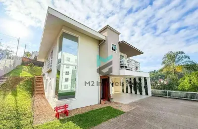 Casa com 4 dormitórios, moderna com suíte master, amplo espaço gourmet e vista privilegiada
