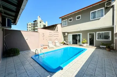 Casa com 3 quartos à venda na rua wilson luz, 45, coqueiros, florianópolis por r$ 2.100.000
