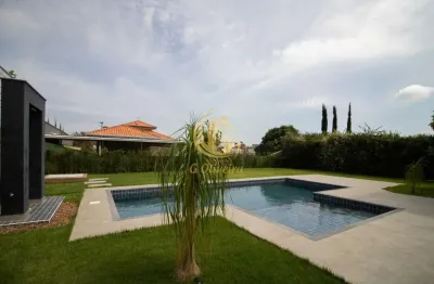 Casa a Venda  em condomínio, 4 quartos, 4 suítes, 3 salas, 4 banheiros, 4 vagas de garagem, A/C 330m² - A/T 850m2.