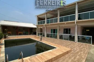 Imóvel de alto padrão em xerém com quintal e espaço de lazer