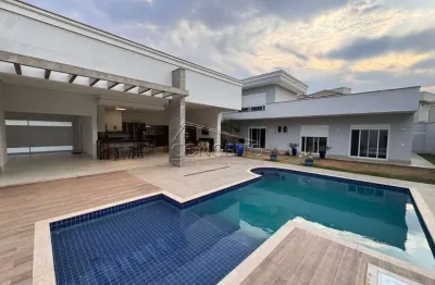 Casa térrea com mezanino à venda no condomínio residencial villa d'aquila com área construída de 451,16 m² | 3 suítes com closet e 6 vagas de garagem