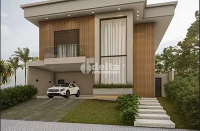 Casa em condomínio com 4 suítes disponível para venda no bairro jardim sul em uberlândia - mg.