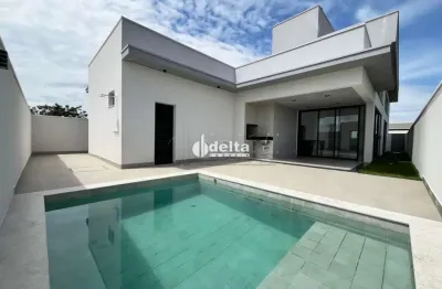 Casa em condomínio com 3 suítes disponível para venda no bairro jardim botânico em uberlândia - mg.