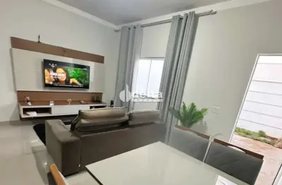Casa geminada disponível para venda no bairro jardim holanda em uberlândia mg