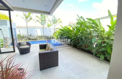 Casa em condomínio com 4 quartos sendo 3 suítes disponível para venda em uberlândia - mg.