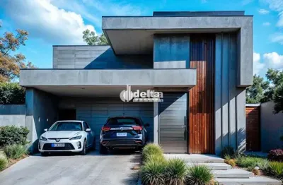 Casa no condomínio terras alpha disponível para venda em uberlândia-mg