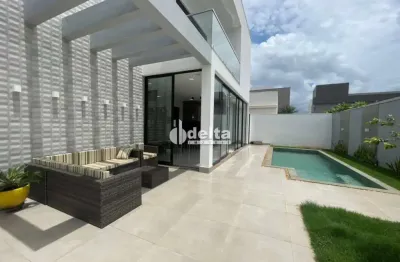 Casa em condomínio com 3 suítes disponível para venda no bairro nova uberlândia em uberlândia - mg.