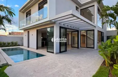 Casa residencial em condomínio disponível para venda no bairro granja marileusa em uberlândia-mg.