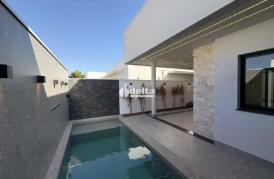 Casa residencial em condomínio disponível para venda no bairro laranjeiras em uberlândia-mg.