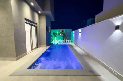Casa residencial em condomínio disponível para venda no bairro nova uberlândia em uberlândia-mg.