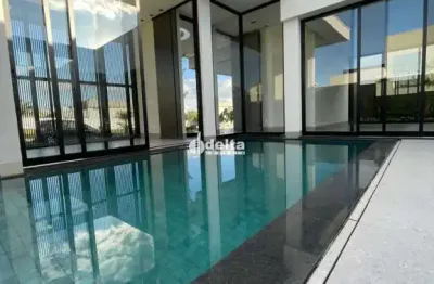 Casa em condominio com 3 suítes disponível para locação no bairro santa mônica em uberlândia-mg