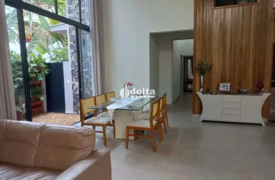 Casa em condomínio disponível para venda no bairro nova uberlândia em uberlândia-mg.