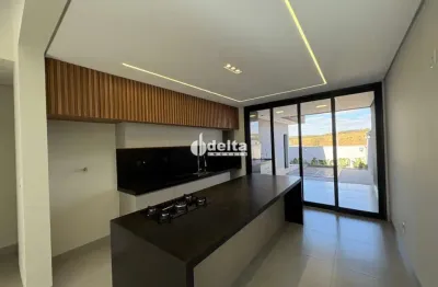 Casa residencial com 3 quartos disponível para venda no bairro santa mônica em uberlândia-mg.