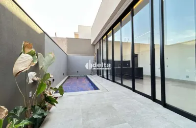 Casa em condominio disponível para venda no bairro laranjeiras em uberlândia-mg