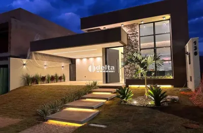 Casa residencial em condomínio com 3 quartos sendo 2 suítes disponível para venda no bairro portal do vale ii em uberlândia-mg.