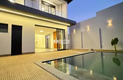 Casa no condomínio terras alpha disponível para venda em uberlândia-mg