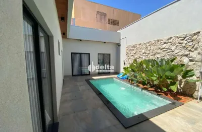 Casa residencial com 3 quartos sendo 1 suíte disponível para venda no bairro jardim botânico em uberlândia-mg.