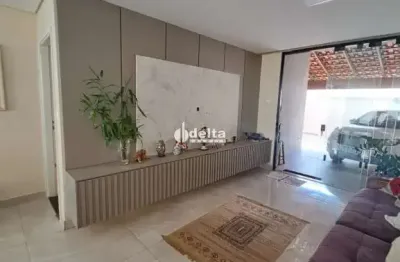 Casa residencial com 3 suítes disponível para venda no bairro cidade jardim em uberlândia-mg