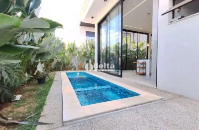 Casa residencial em condomínio com 4 suítes disponível para venda no bairro granja marileusa em uberlândia - mg.