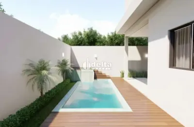 Casa em condomínio com 3 suítes disponível para venda no bairro novo mundo em uberlândia-mg