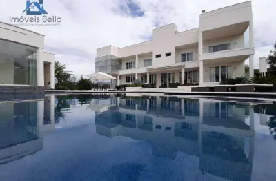 Casa com 6 dormitórios, 746 m² - venda por r$ 4.800.000,00 ou aluguel por r$ 26.686,42/mês - ville chamonix - itatiba/sp