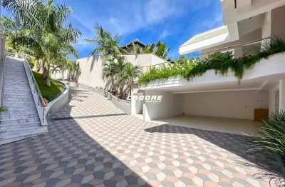 Casa de alto padrão com 3 dormitórios sendo 3 suítes e um amplo espaço de área externa com campo de futebol! | cadore imóveis