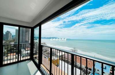 Apartamento para locação com vista permanente para o mar em balneário perequê - porto belo i cadore imóveis