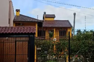 Casa com 3 quartos à venda na Rua Lola de Oliveira, Parque Santa Fé, Porto Alegre
