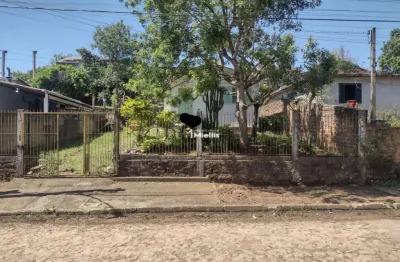 Terreno com uma casa de madeira no jardim fiuza em viamão