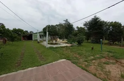 Oásis sustentável: sítio com painel solar e 3 suítes para venda