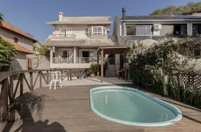 Casa com 3 quartos à venda na Rua Charruas, 267, Espírito Santo, Porto Alegre