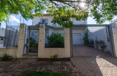 Casa com 4 quartos à venda na Rua das Bromélias, 184, Moinhos De Vento, Canoas