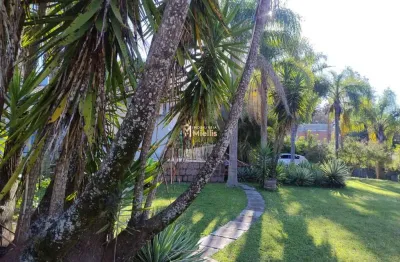 Casa à venda em viamão, bairro tarumã - oportunidade única! atenção investidores, terreno em ótima localização... em frente ao lago tarumã.