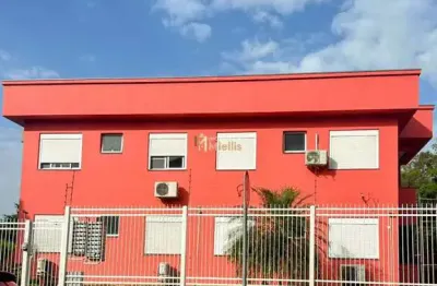 Apartamento semimobiliado com varanda e piscina no condomínio em viamão - venda