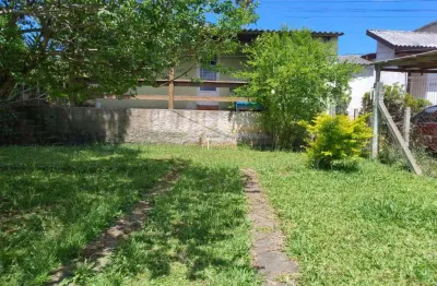 Atenção investidor...Casa à venda com duas saídas em Viamão, bairro Tarumã, 121m²