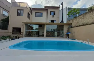 Casa com 3 quartos à venda na Rua Professor Abílio Azambuja, 43, Jardim do Salso, Porto Alegre