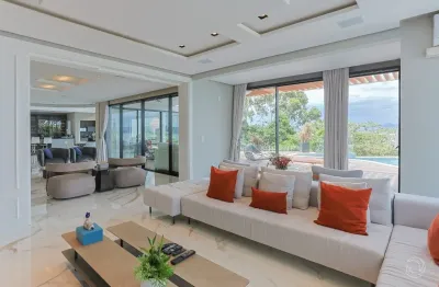 MARAVILHOSA Casa em condomínio fechado com 5 suítes em Cacupé