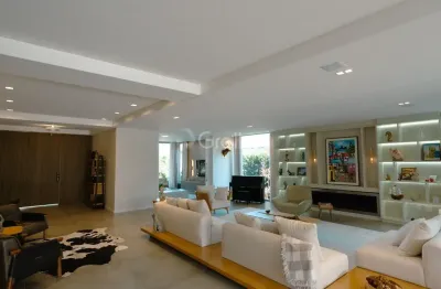 MARAVILHOSA Casa de 1.018,00m² com 5 quartos sendo 4 suítes no Cacupé