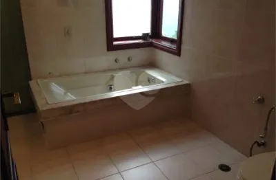 Casa em condomínio fechado com 4 quartos à venda na alameda tambaqui, 123, alphaville, santana de parnaíba, 570 m2 por r$ 2.500.000