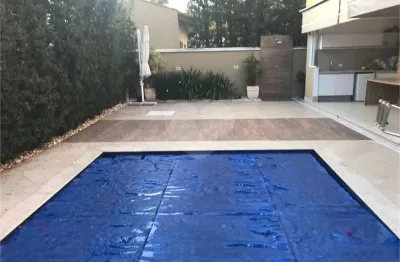 Casa em condomínio fechado com 4 quartos à venda na alameda corvina, 591, alphaville, santana de parnaíba, 440 m2 por r$ 2.750.000