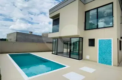 Casa em condomínio fechado com 4 quartos à venda na alameda das jabuticabeiras, 110, alphaville, santana de parnaíba, 500 m2 por r$ 5.500.000