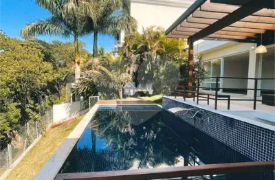 Casa em condomínio fechado com 4 quartos à venda na alameda dos ingás, 100, alphaville, santana de parnaíba, 900 m2 por r$ 6.990.000