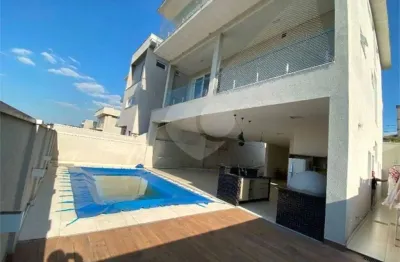 Casa em condomínio fechado com 4 quartos à venda na rua tomi saburo yamamoto, 92, jardim das cerejeiras, arujá, 330 m2 por r$ 2.500.000